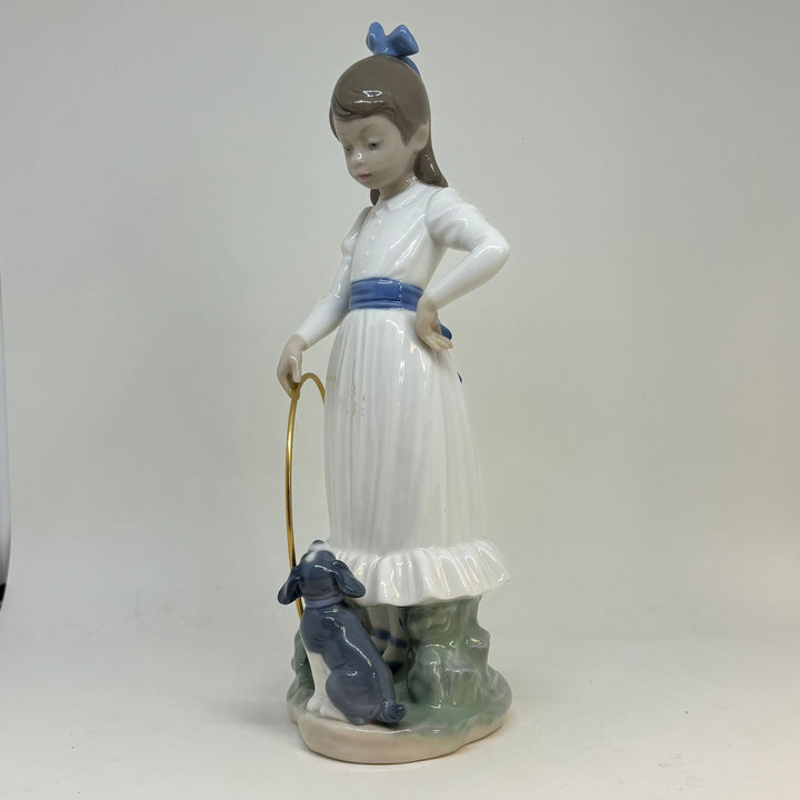 NAO by Lladró 'My Dog Does Tricks' Porcelain Figurine