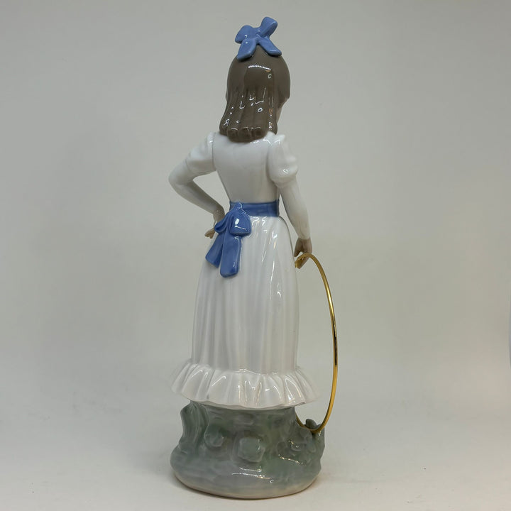 NAO by Lladró 'My Dog Does Tricks' Porcelain Figurine