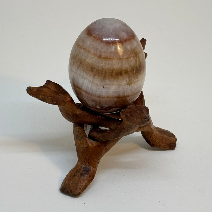 Vintage Polished Semiprecious Stone Egg on Hand-Carved Wooden Stand