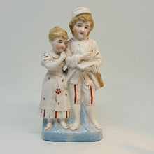 Load image into Gallery viewer, Vintage Hand-Painted Postwoman and Child Figurine