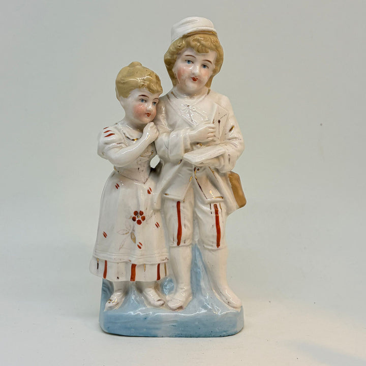 Vintage Hand-Painted Postwoman and Child Figurine