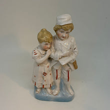 Load image into Gallery viewer, Vintage Hand-Painted Postwoman and Child Figurine