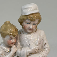 Load image into Gallery viewer, Vintage Hand-Painted Postwoman and Child Figurine