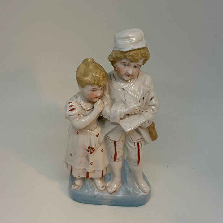 Vintage Hand-Painted Postwoman and Child Figurine